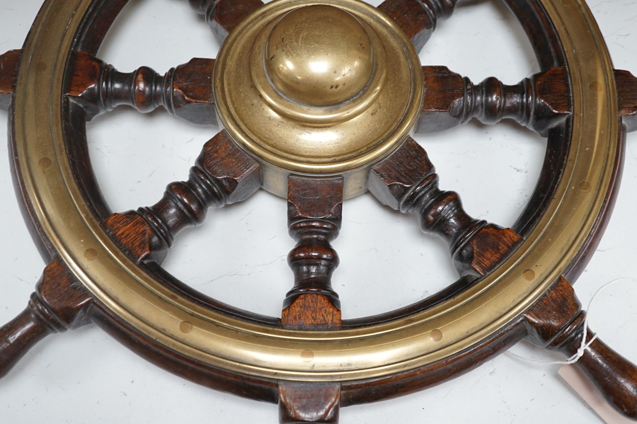 A 19th century mahogany and brass mounted ship's wheel, 60cm